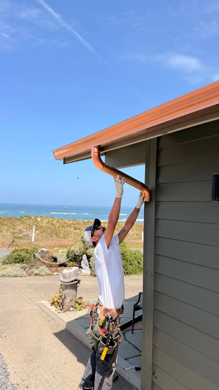 Copper seamless gutter install Pacific coast