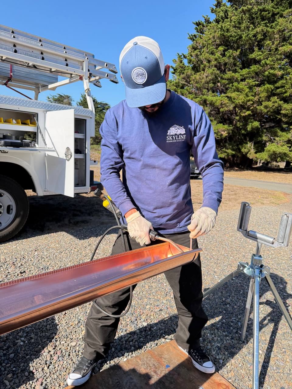 Skyline team member working on a copper gutter