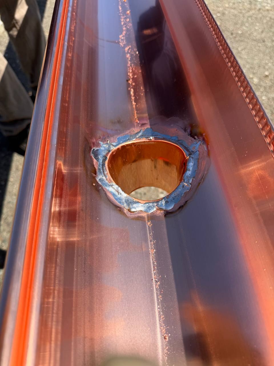 Copper outlet and joined seams