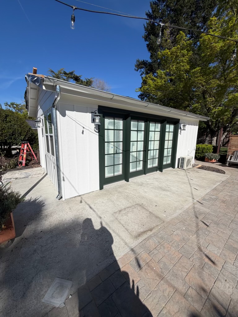 Seamless gutter installation completed on studio outbuilding